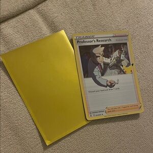 Professor's Research Trainer Card with Yellow Sleeve